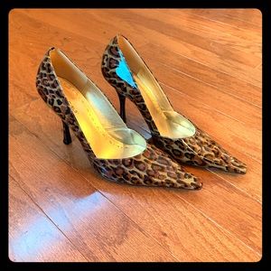Leather print point toe heels.